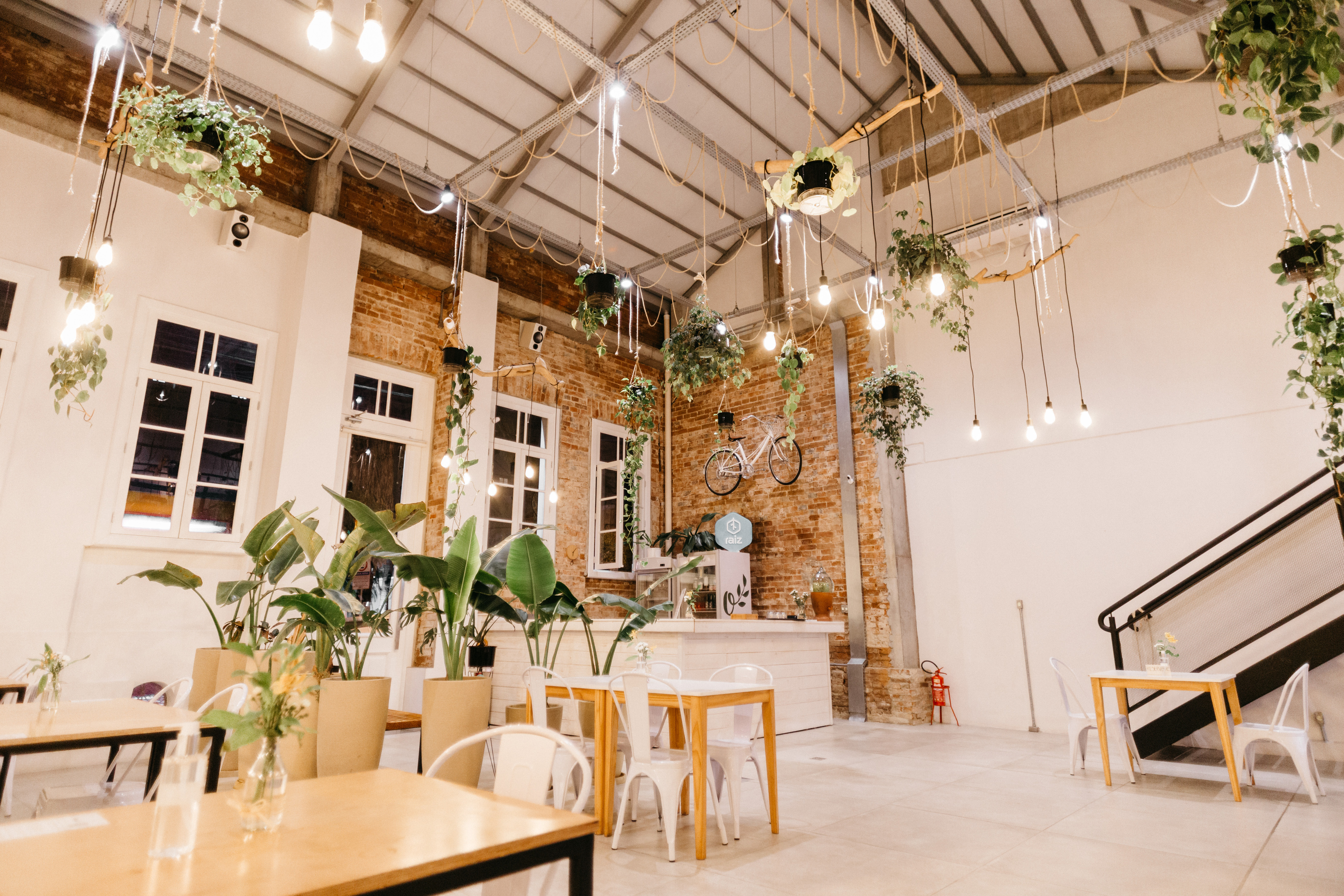 Cafe with flowers and modern furniture